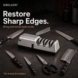 UseLuck knife sharpener set displayed on a dark countertop with multiple kitchen knives, scissors, and a cleaver around it. The silver and black sharpener is centered, with large promotional text reading 'Restore Sharp Edges.