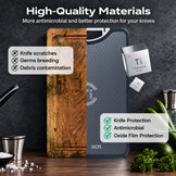 A dark gray UCIU knife guard case with a circular logo, shown alongside a wooden cutting board on a dark tabletop. The image features promotional text highlighting high-quality materials, antimicrobial properties, and oxide film protection, with small titanium and germ-related graphic elements floating near the case.